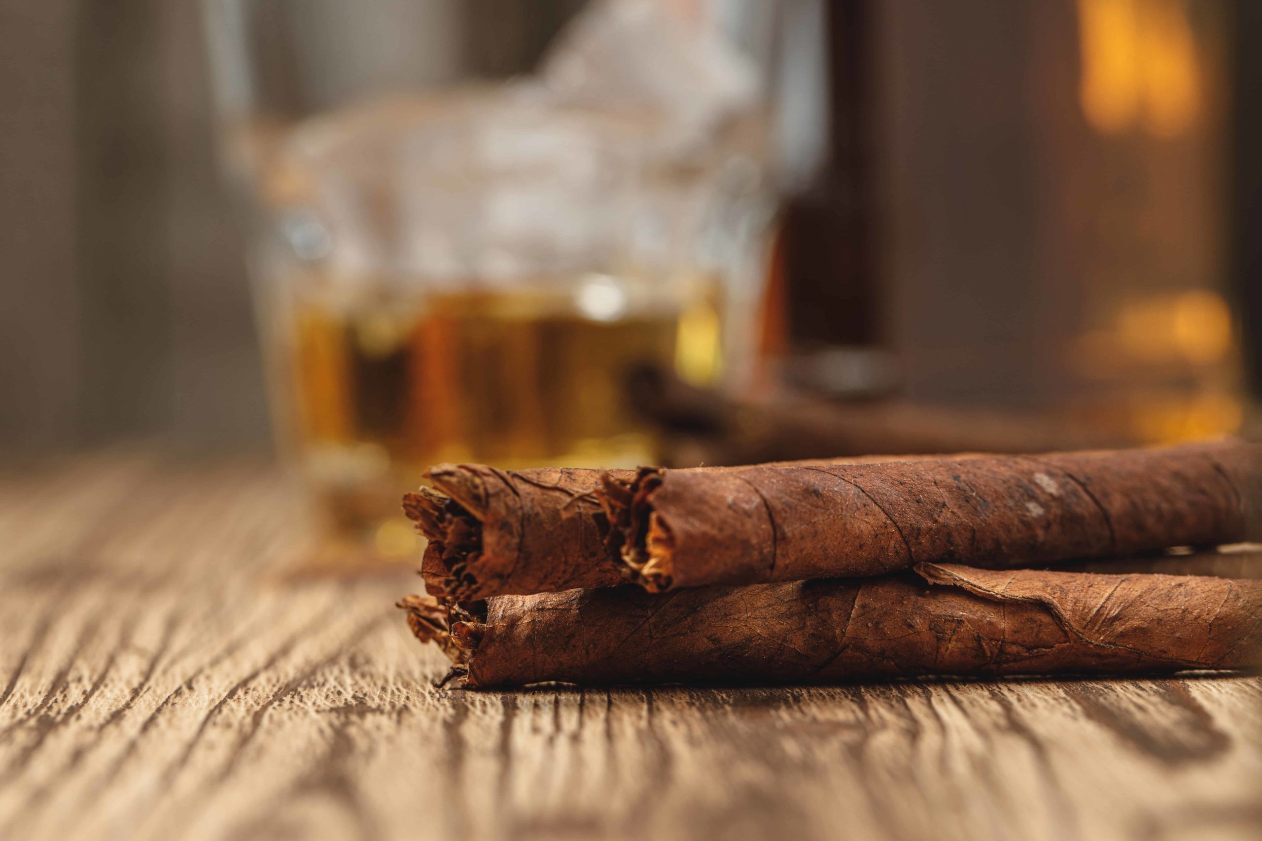 Cigars on wooden table